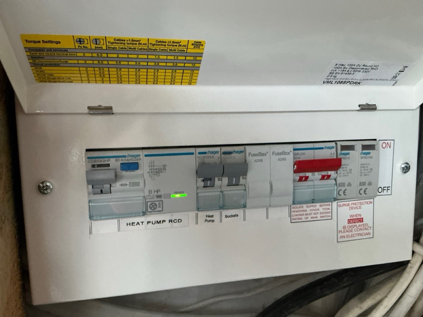 Consumer unit with dedicated heat pump circuits and surge protection