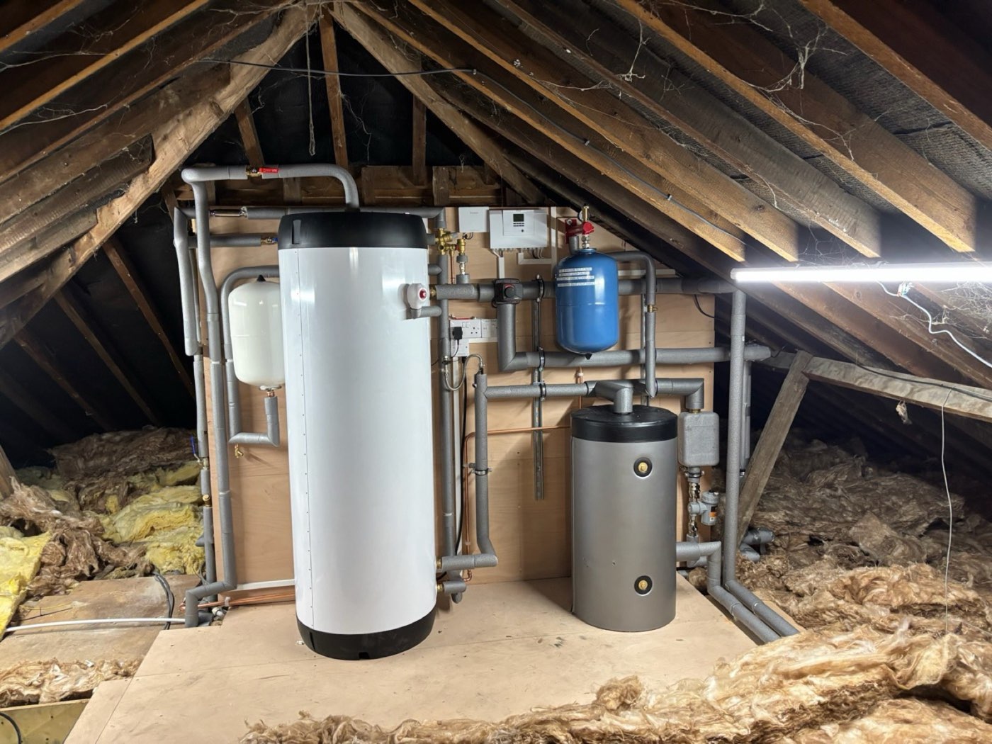 Loft hot water cylinder with buffer tank and expansion vessels