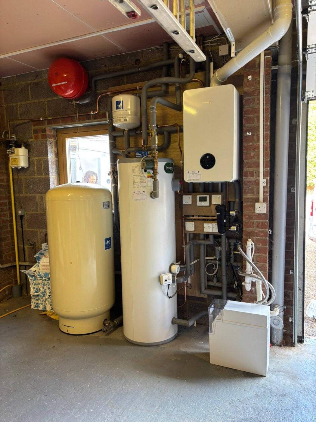 Heat pump plant room with cylinder, buffer and accumulator