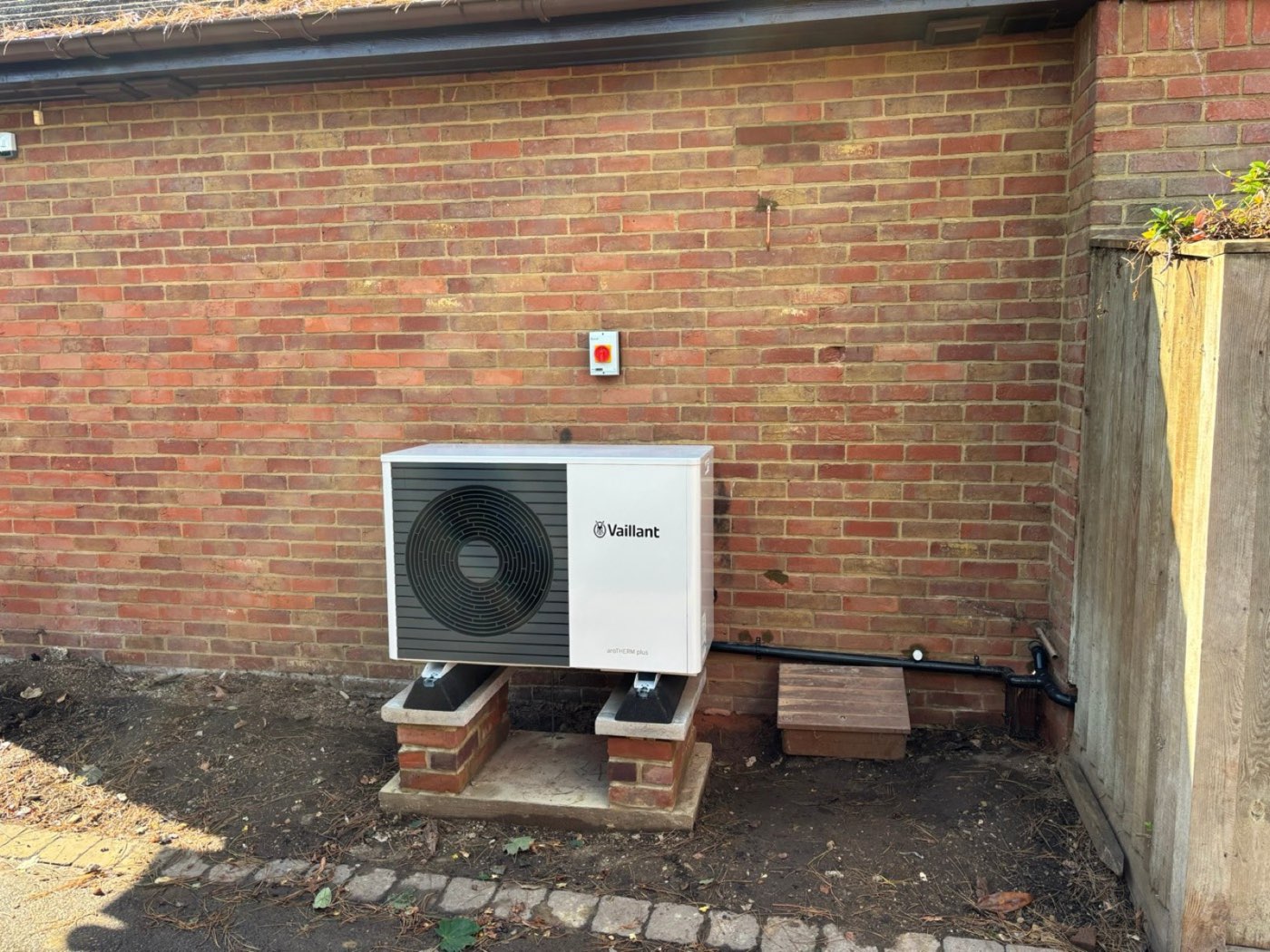 Vaillant aroTHERM air source heat pump on brick plinths